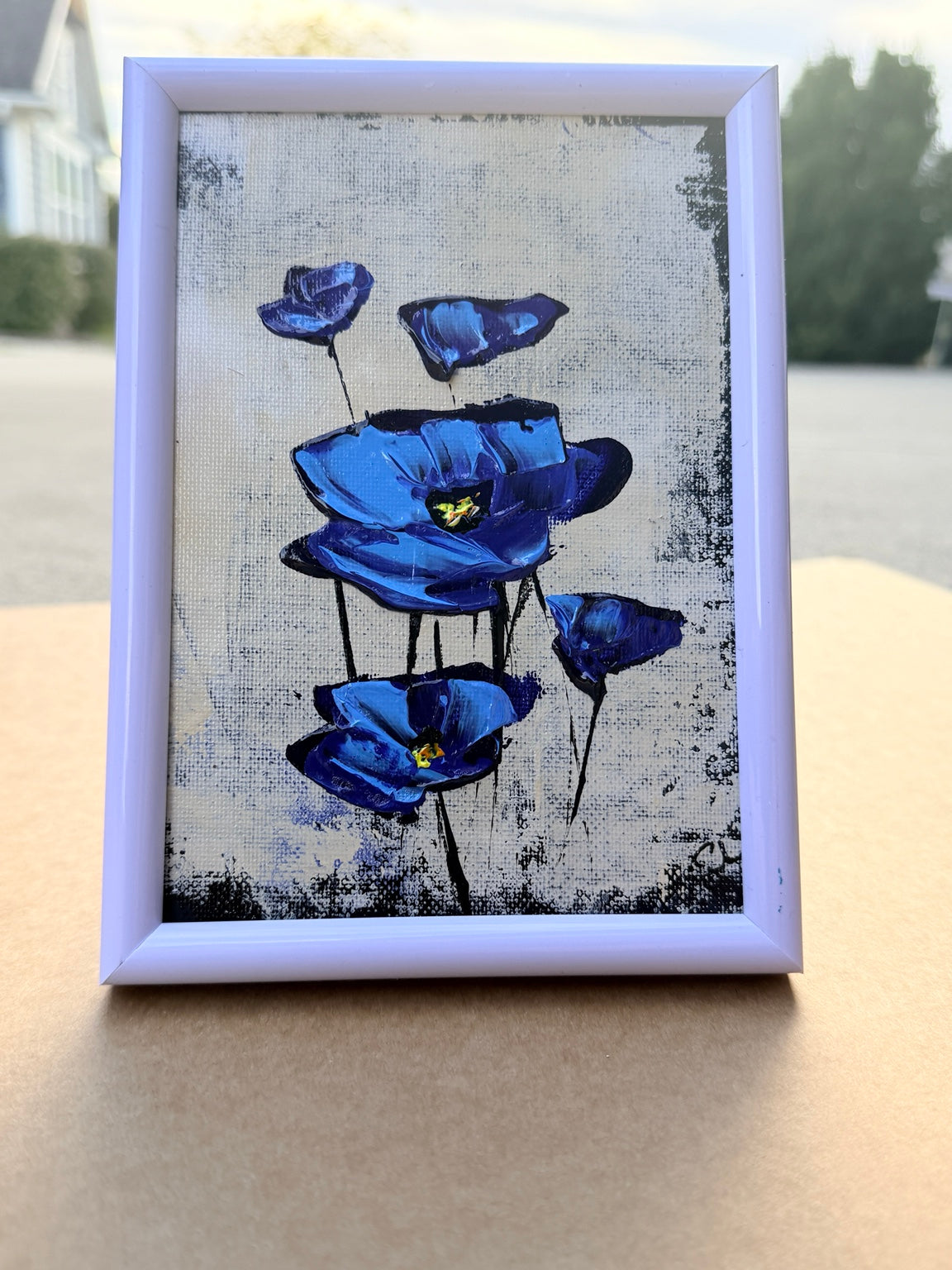 Actual original blue poppies painting with cream background and included white frame