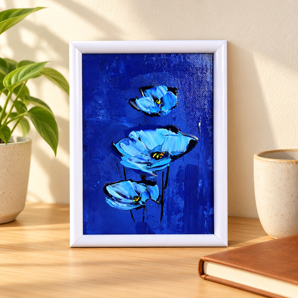 Styled desk preview of Remember What Is Important blue poppies; decorative items not included