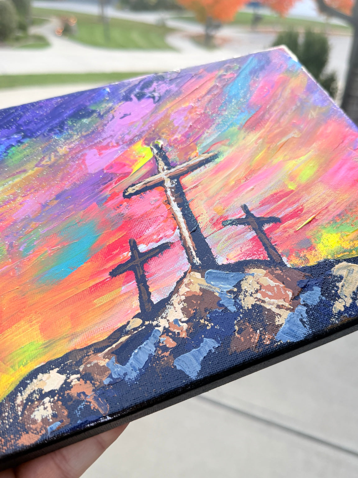 Close-up of paint texture and three crosses